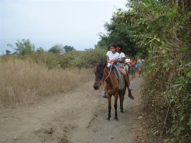 Tina rides up Taal Volcano